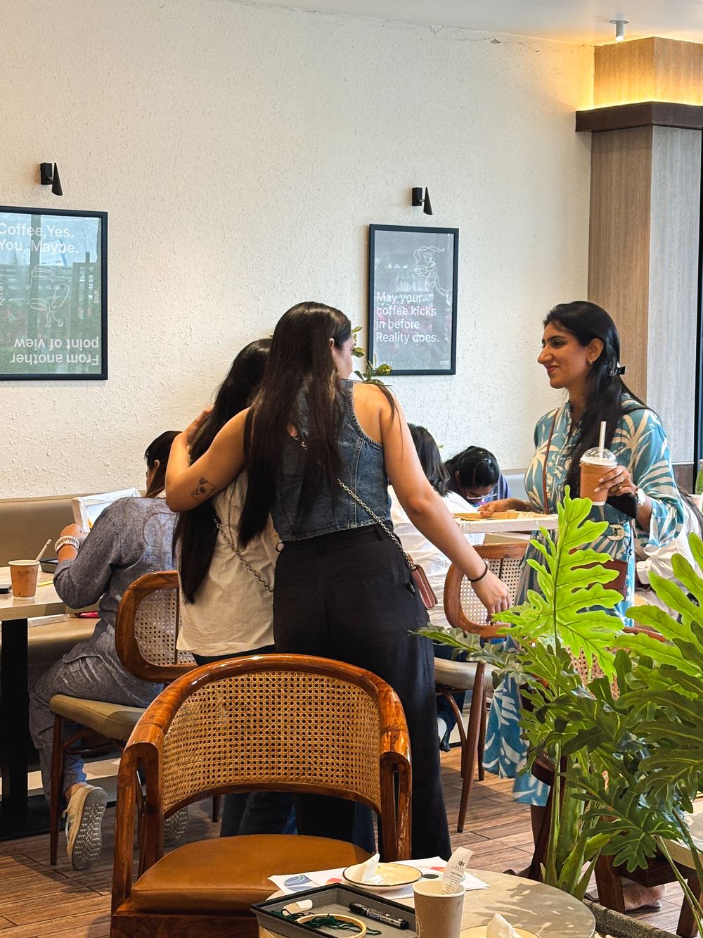Kapai team greeting a guest